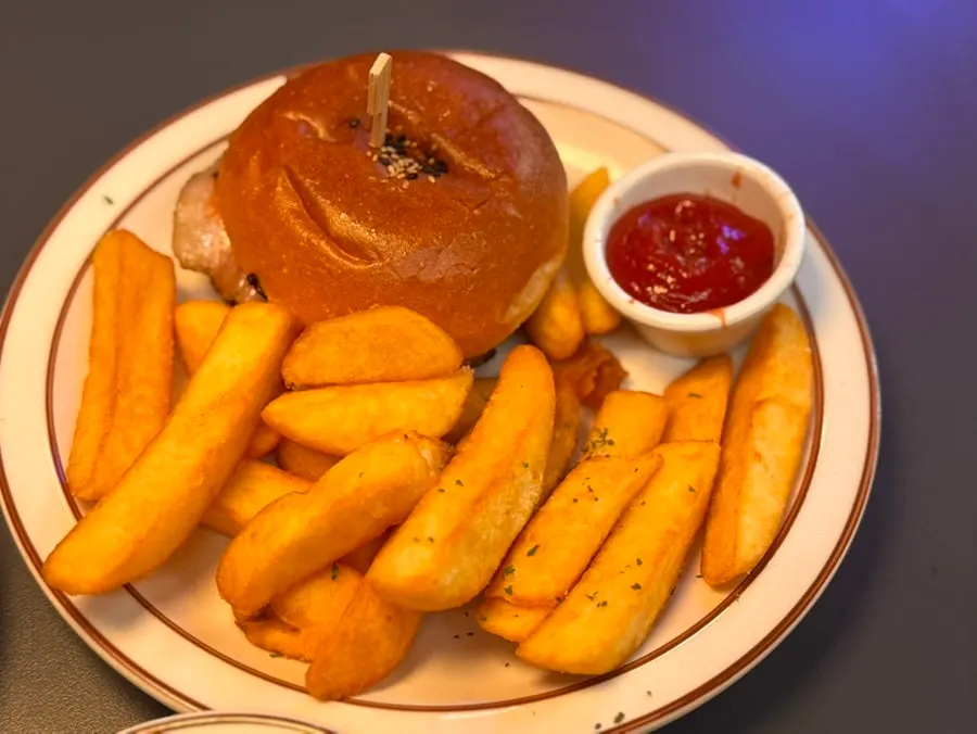Bacon cheeseburger showing the thick patty
