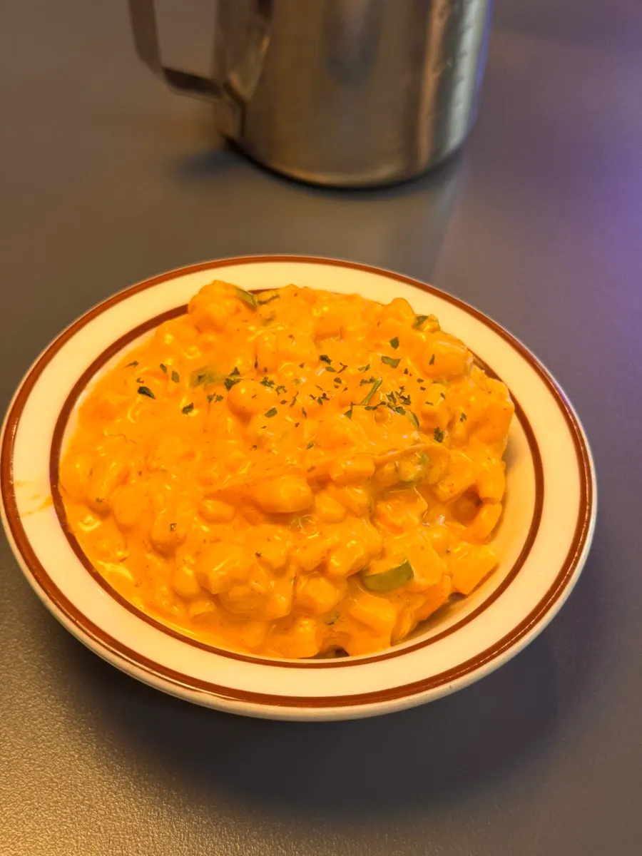 Corn salad tossed in smoky sauce