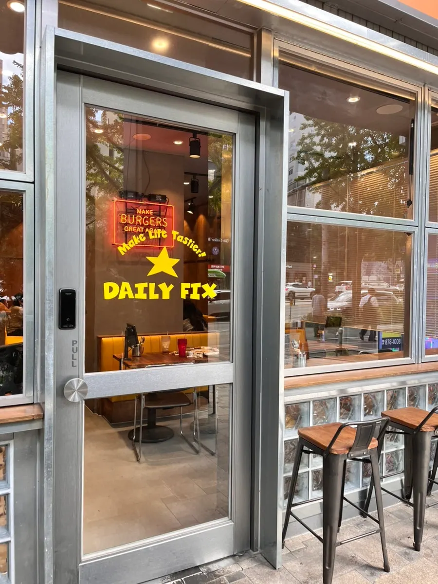 Vertical photo of a burger at Daily Fix Seoul National University Entrance