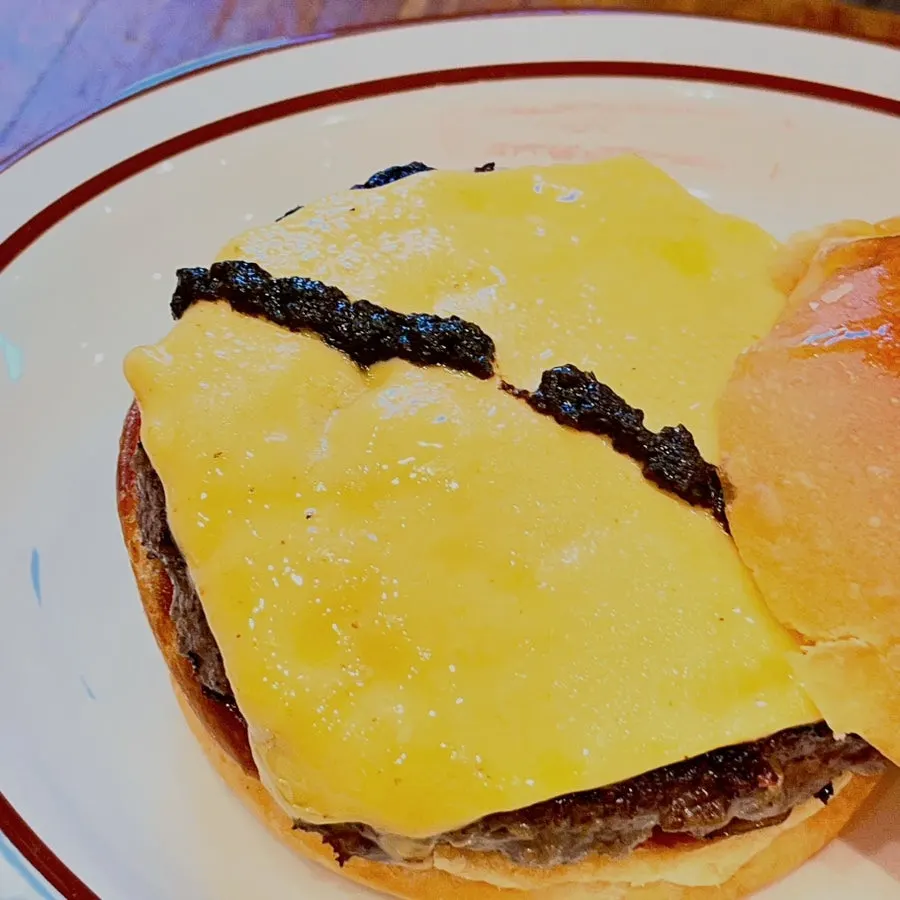 Close-up of the Truffle Mushroom Burger topped with mushrooms