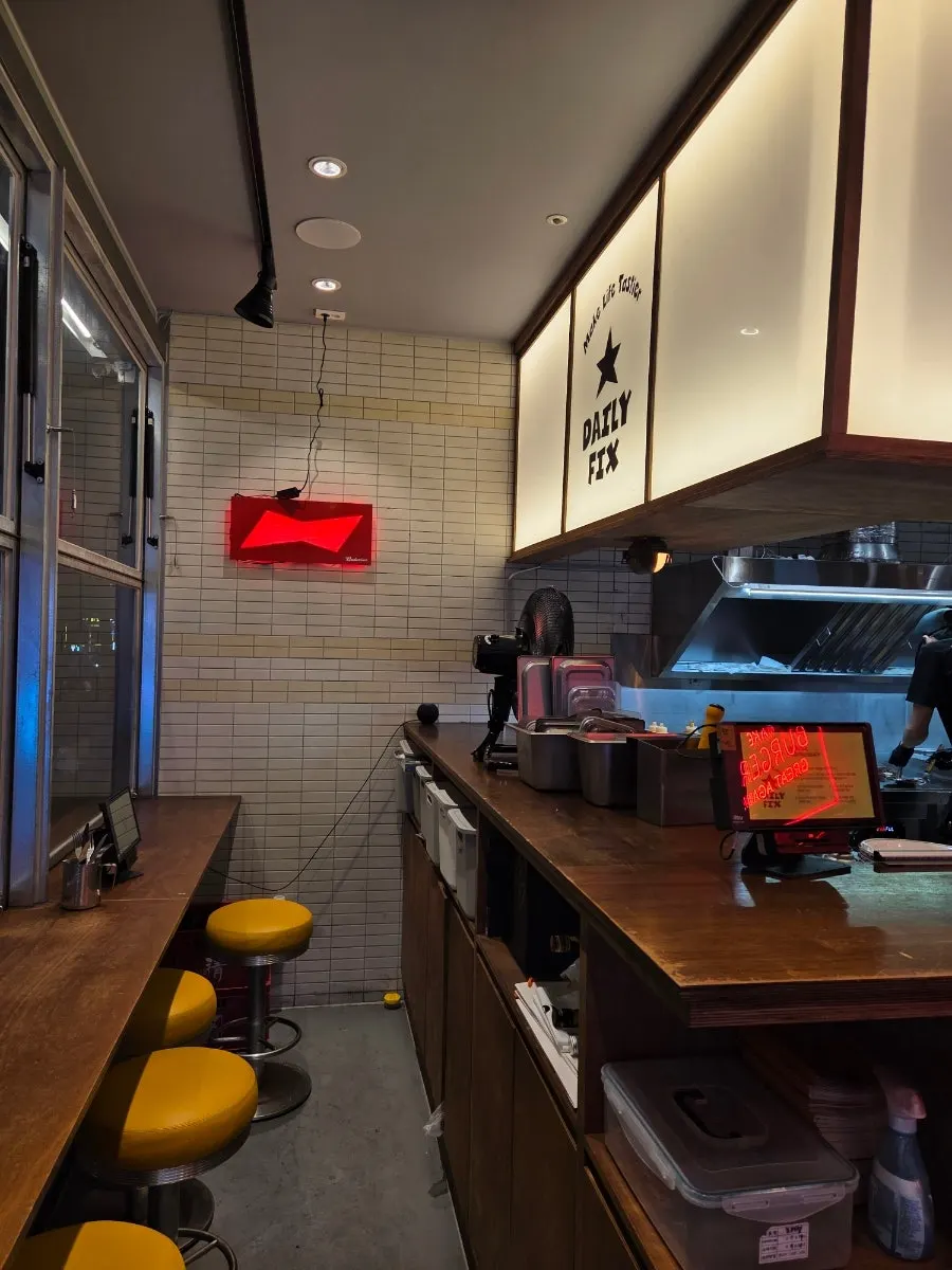 Bacon cheese burger and fries table spread