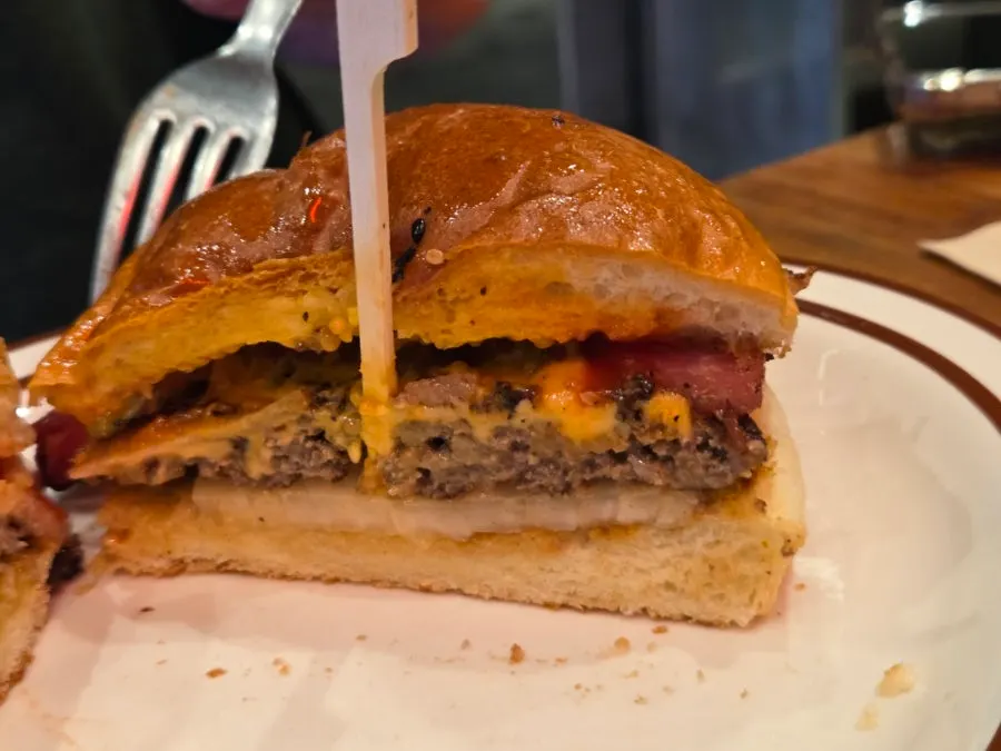 Wide shot of burger and fries spread