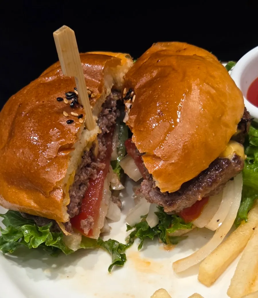 Cross-section of the classic cheeseburger with vegetables
