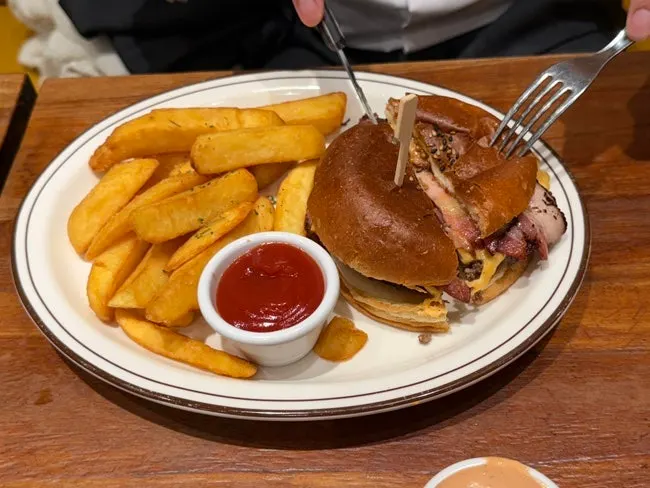 Two burger sets laid out on the table at Daily Fix