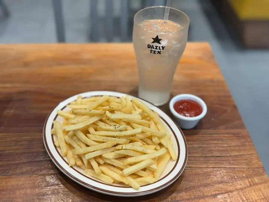 A glass of ice water brought by staff