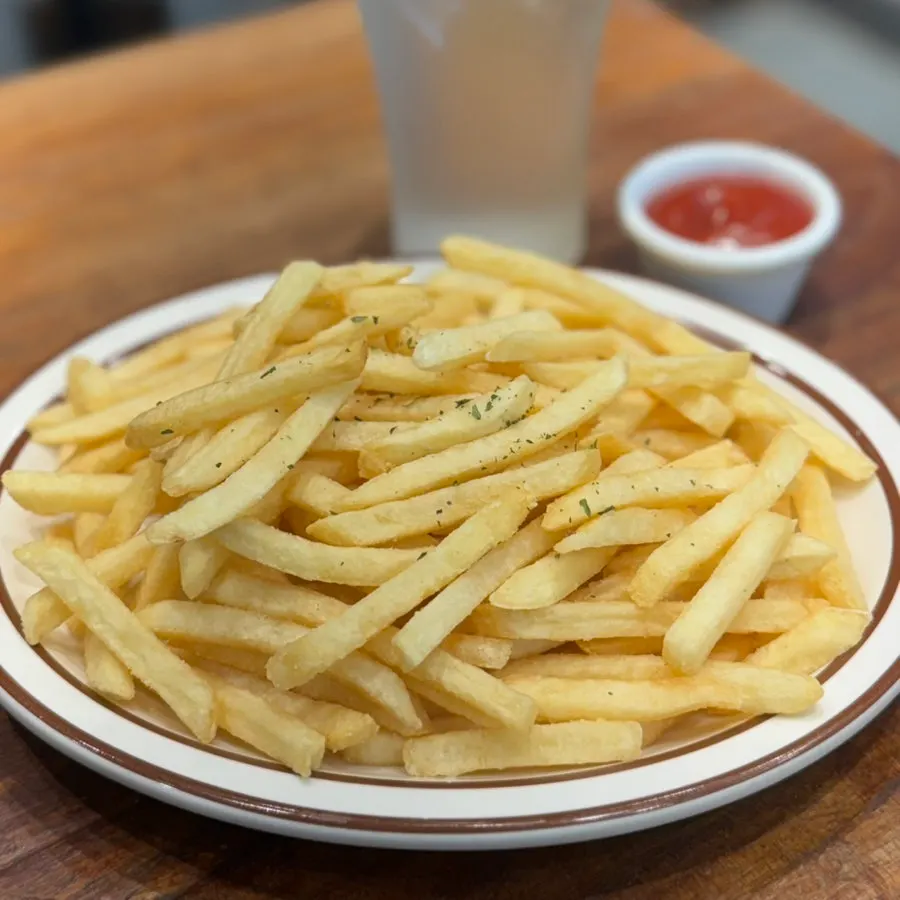 A plate of Belgian shoestring French Fries