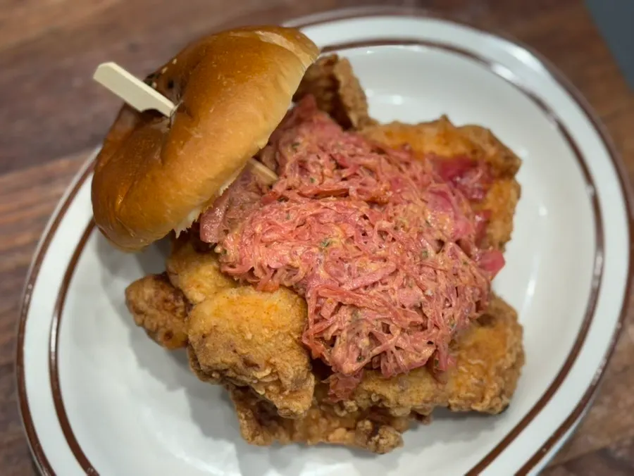 Cross-section of the chicken burger with homemade coleslaw