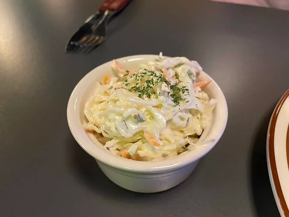 Regular and spicy coleslaw side by side