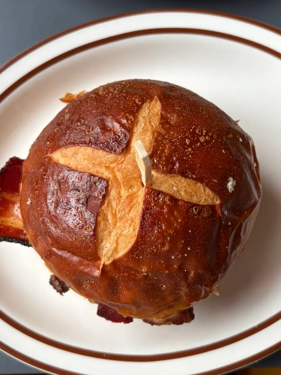 Bacon cheese burger with a pretzel bun upgrade