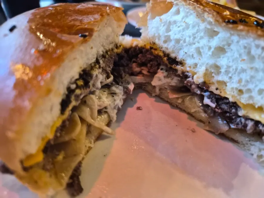 Inside the burger showing the Hanwoo patty and mushrooms