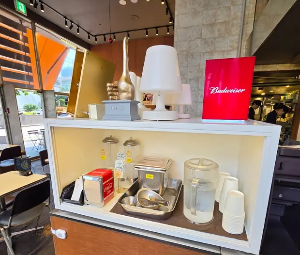 Self-serve bar with water and handmade pickles