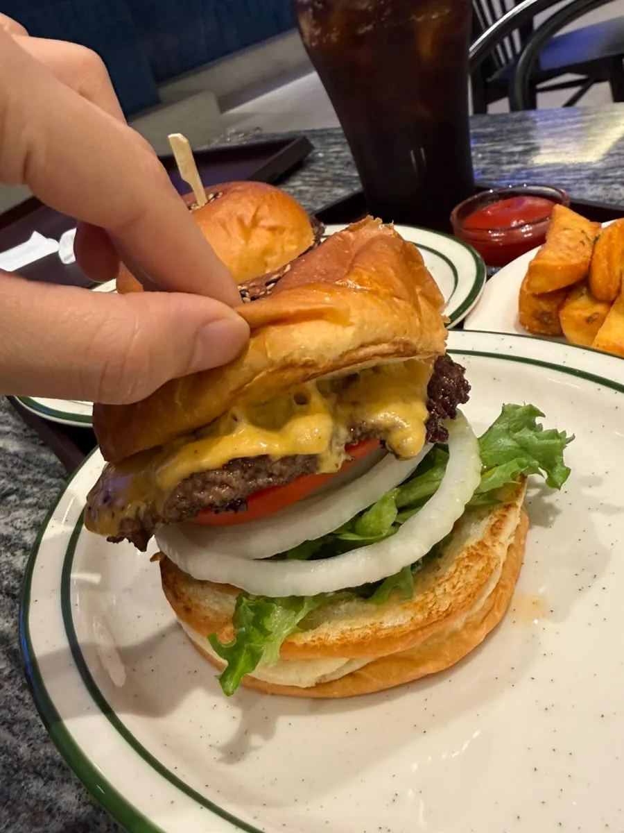 Classic burger with tomato and vegetables
