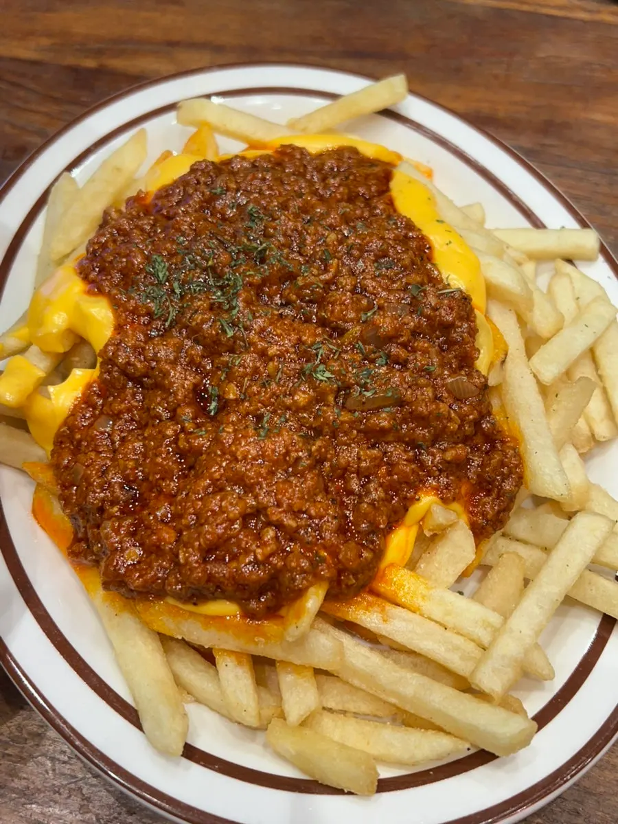 A plate of chili cheese fries