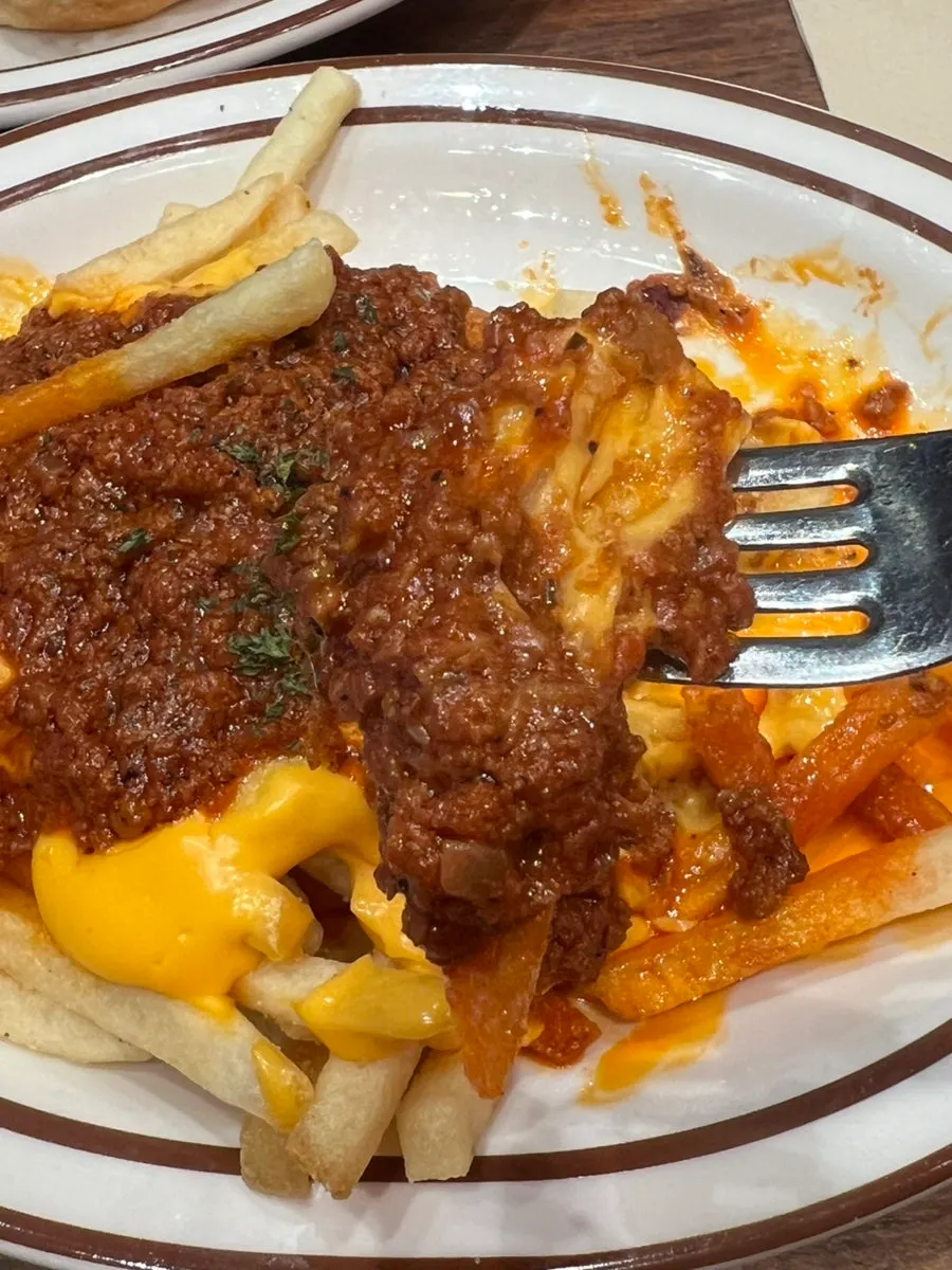Close-up of the chili cheese fries