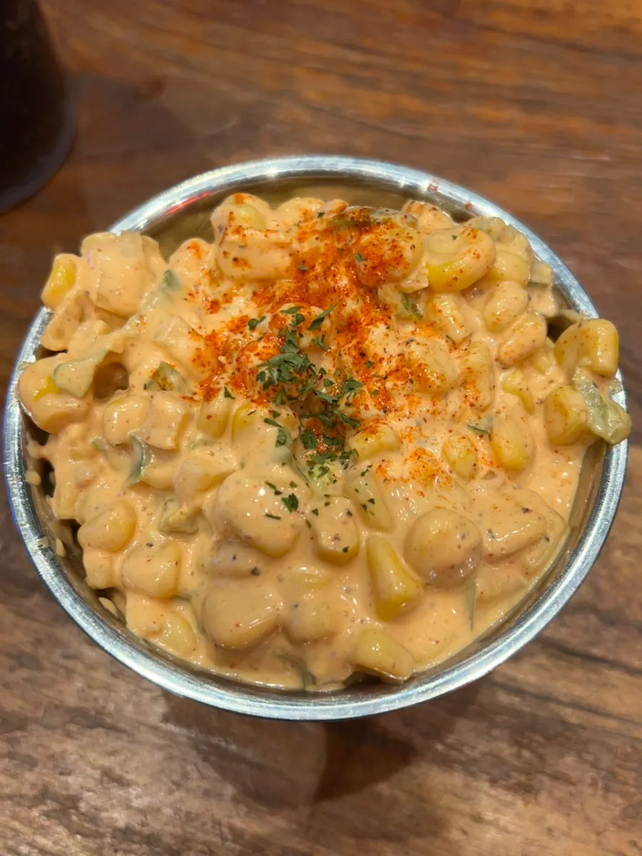 Corn salad loaded with cheese sauce
