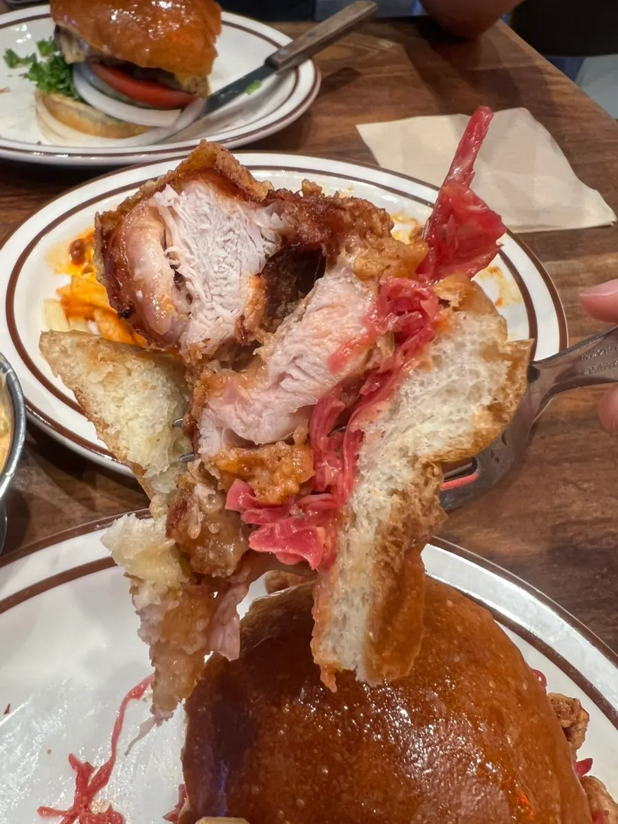 Cross-section of the chicken burger with buttery bun