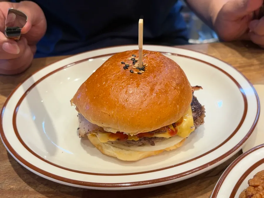 Cross-section of the chicken burger with salad