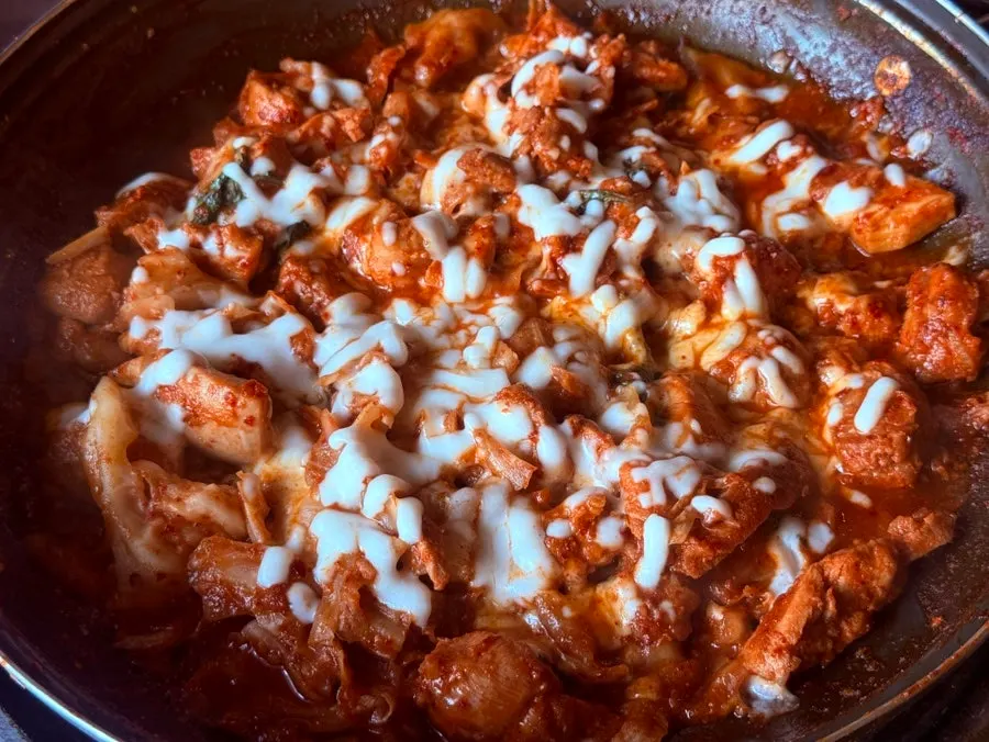 Cheese dakgalbi piled high with melted cheese