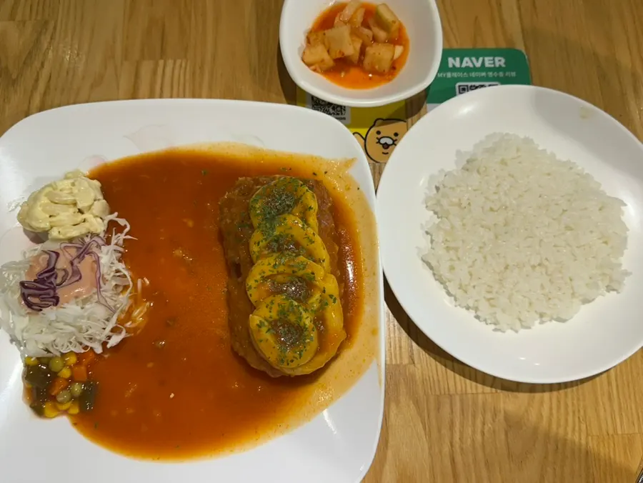 Plate of sweet potato cheese pork cutlet topped with sweet potato mousse