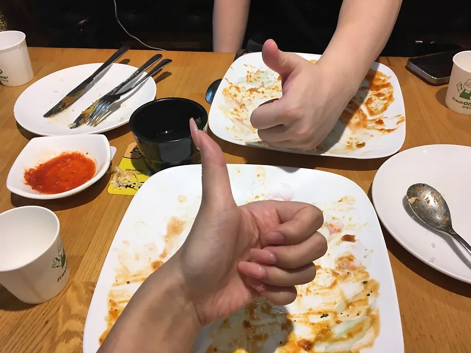 An empty, cleared pork cutlet plate