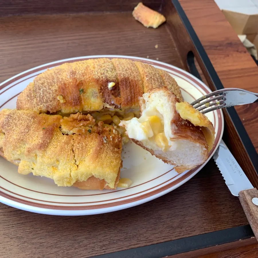 Cross-section of Dalgeuraem's egg tart showing the packed filling
