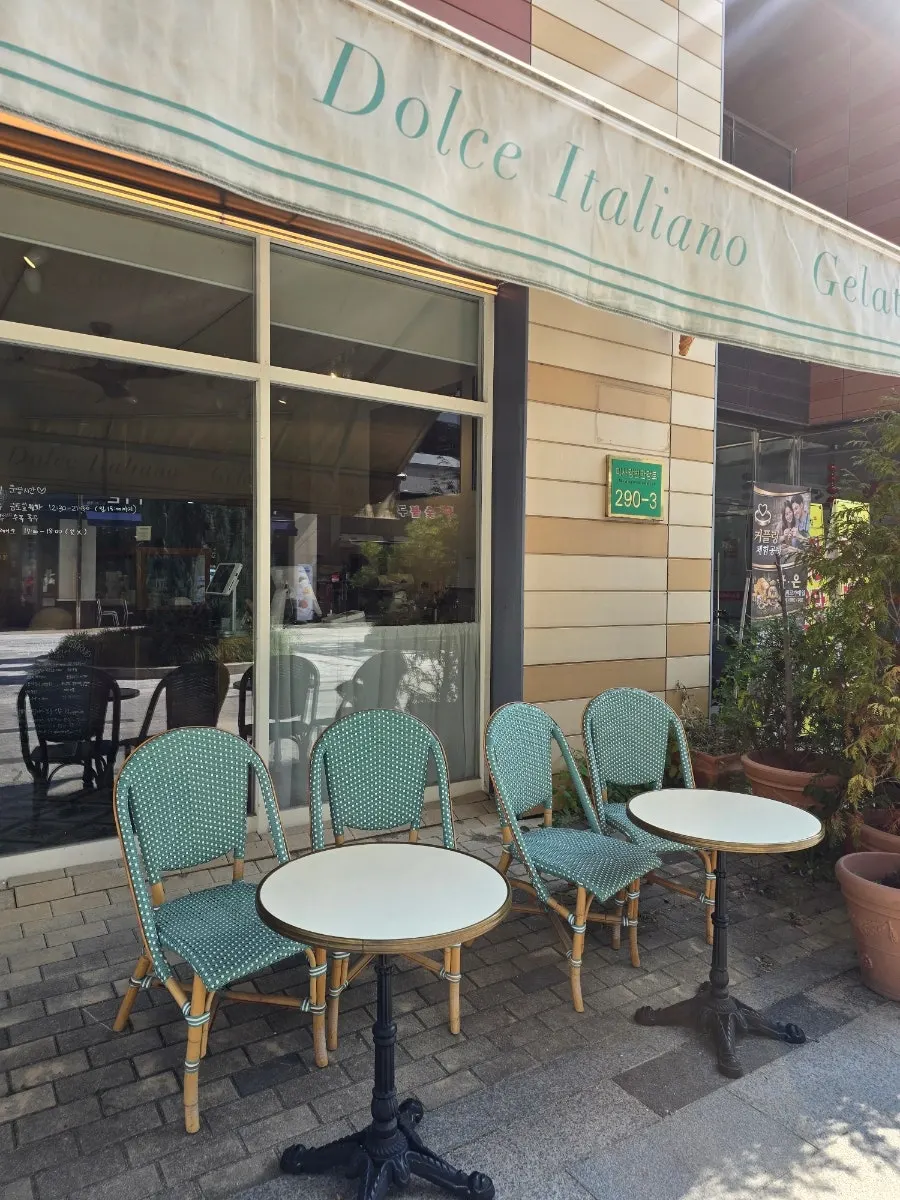 Outdoor seating set up in front of the store