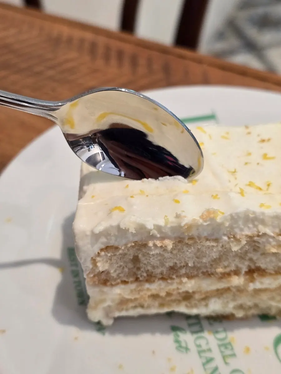 Cappuccino and lemon tiramisu together on the table