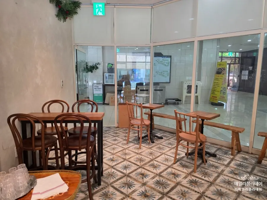 Wide shot of the wood-toned café interior