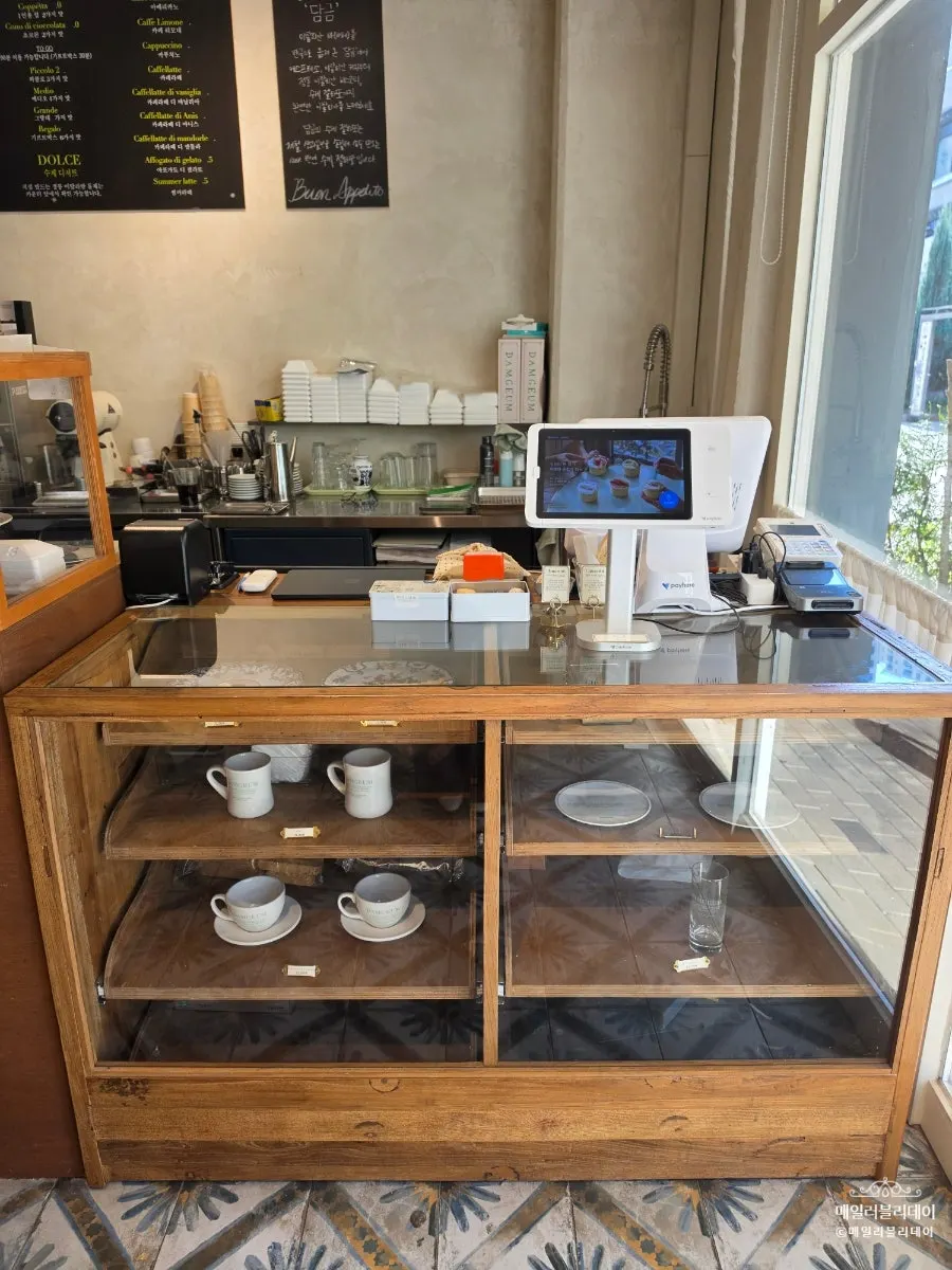 Gelato showcase with flavor labels at Damgeum Gelato
