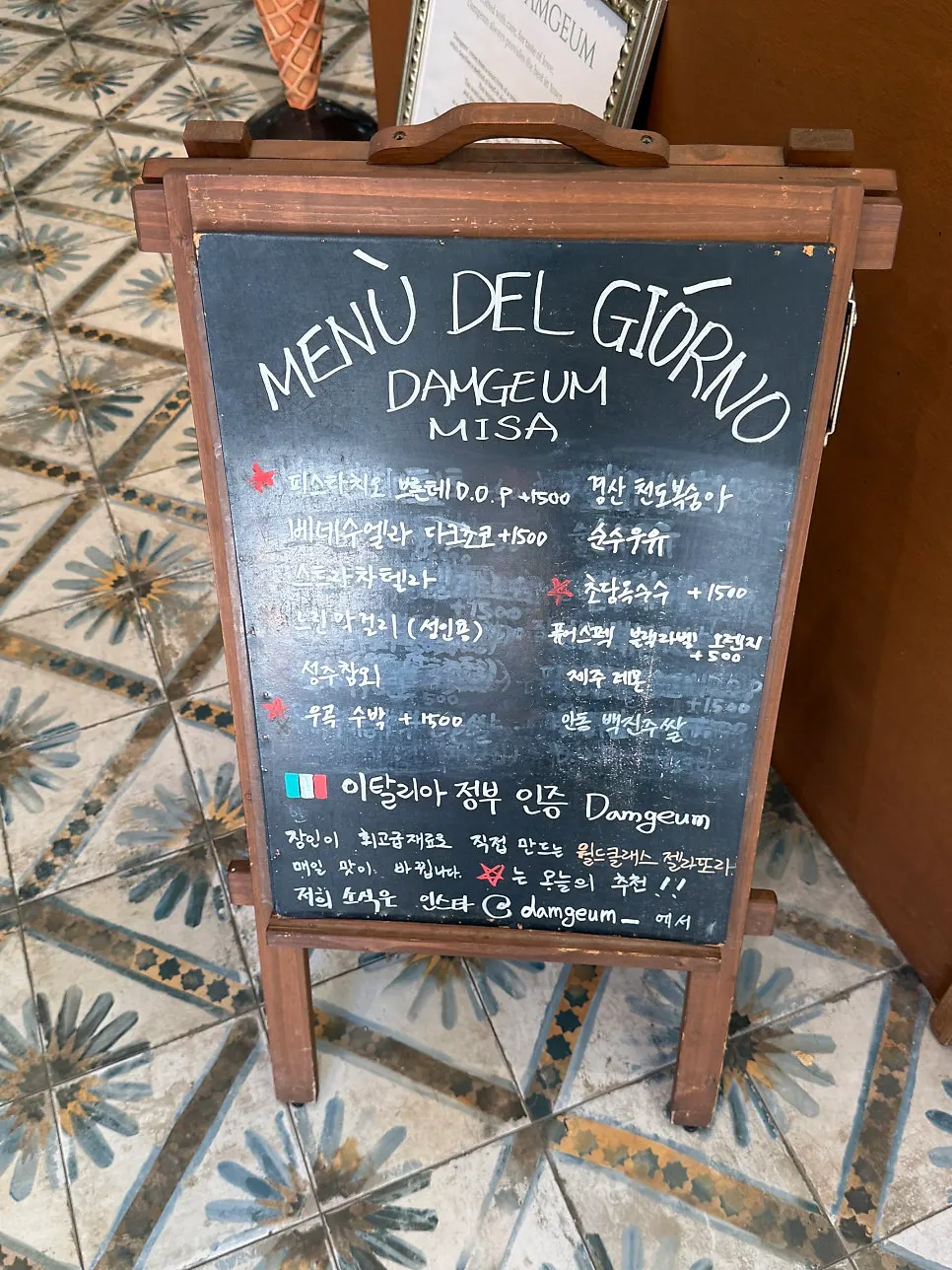 Counter with the gelato showcase and menu visible