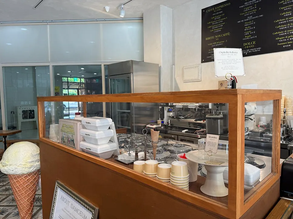 Gelato showcase displaying a variety of flavors