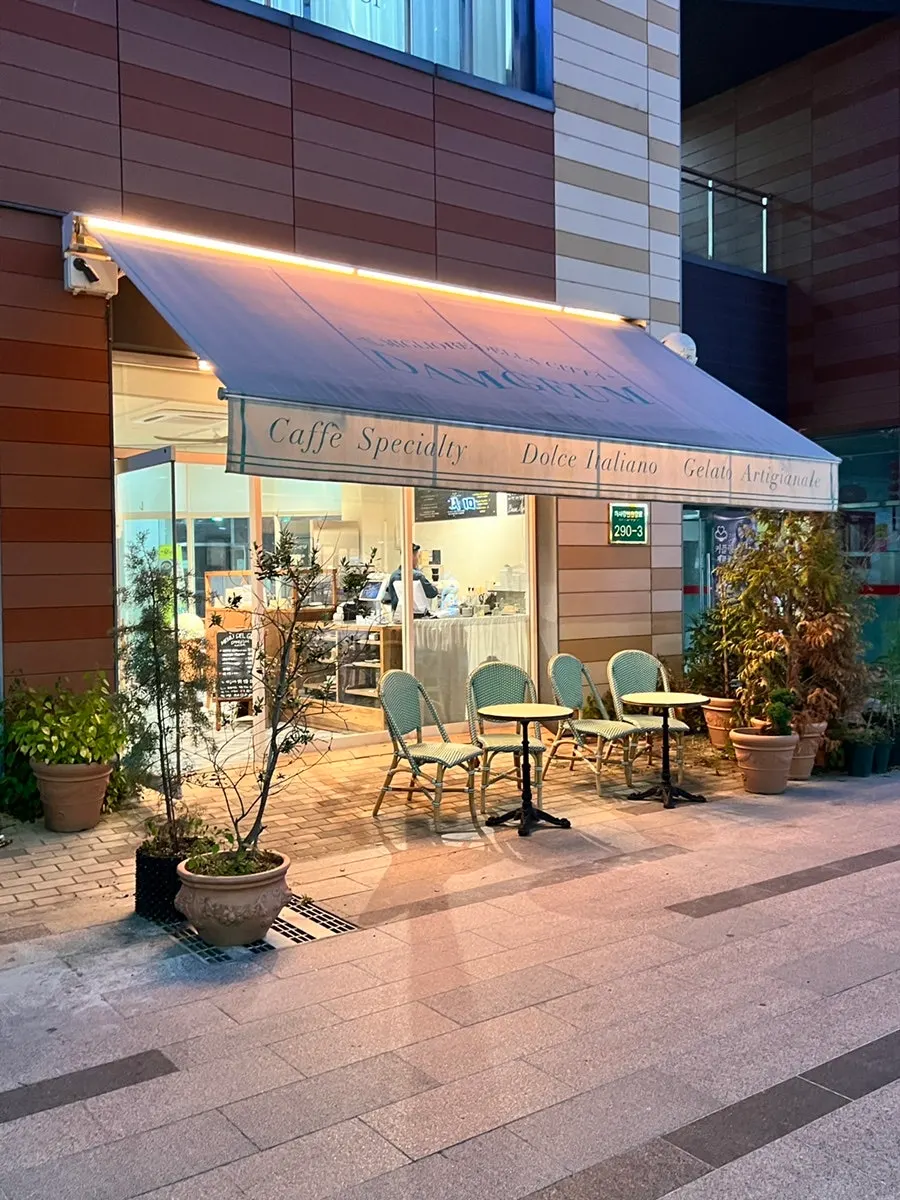 Exterior of Damgeum Gelato Misa Branch lit up in the evening