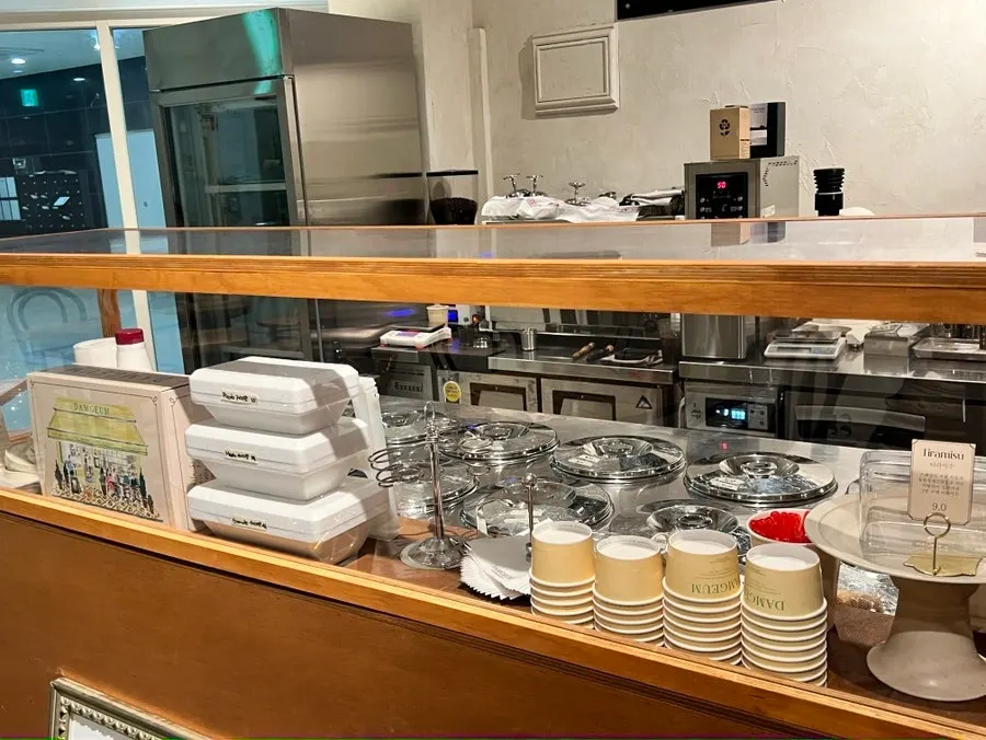 Showcase display with various gelato flavors at Damgeum Gelato