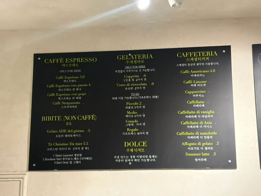Gelato display case with a variety of flavors