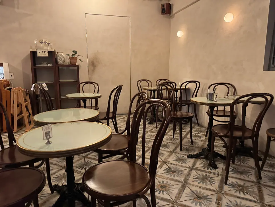 Interior of Damgeum with wood-tone furniture and lighting