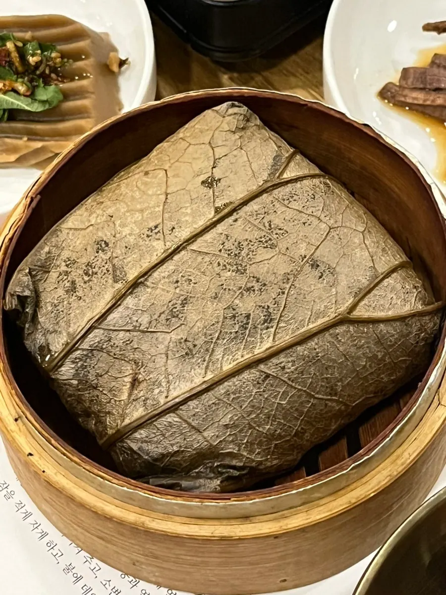 Lotus leaf rice wrapped in a lotus leaf