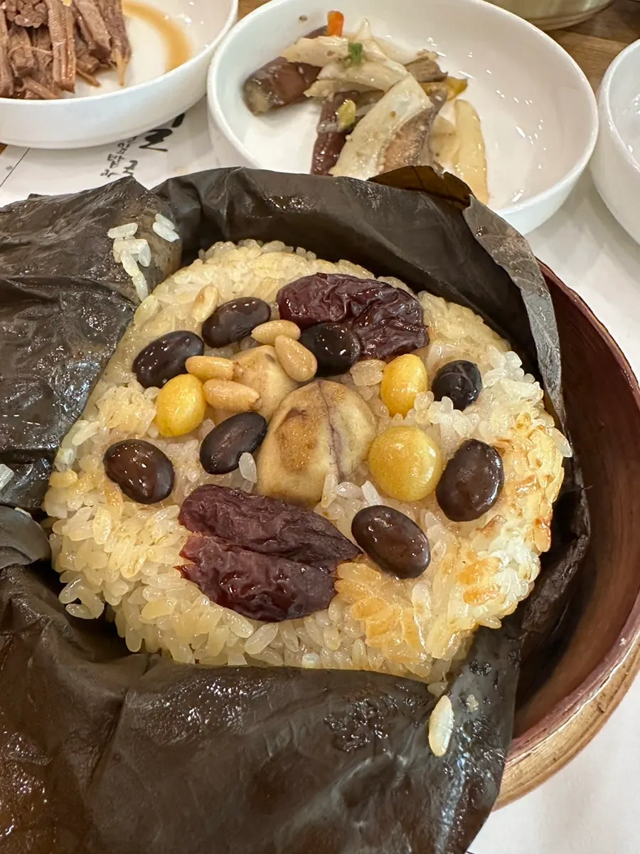 Lotus leaf rice with the leaf unwrapped