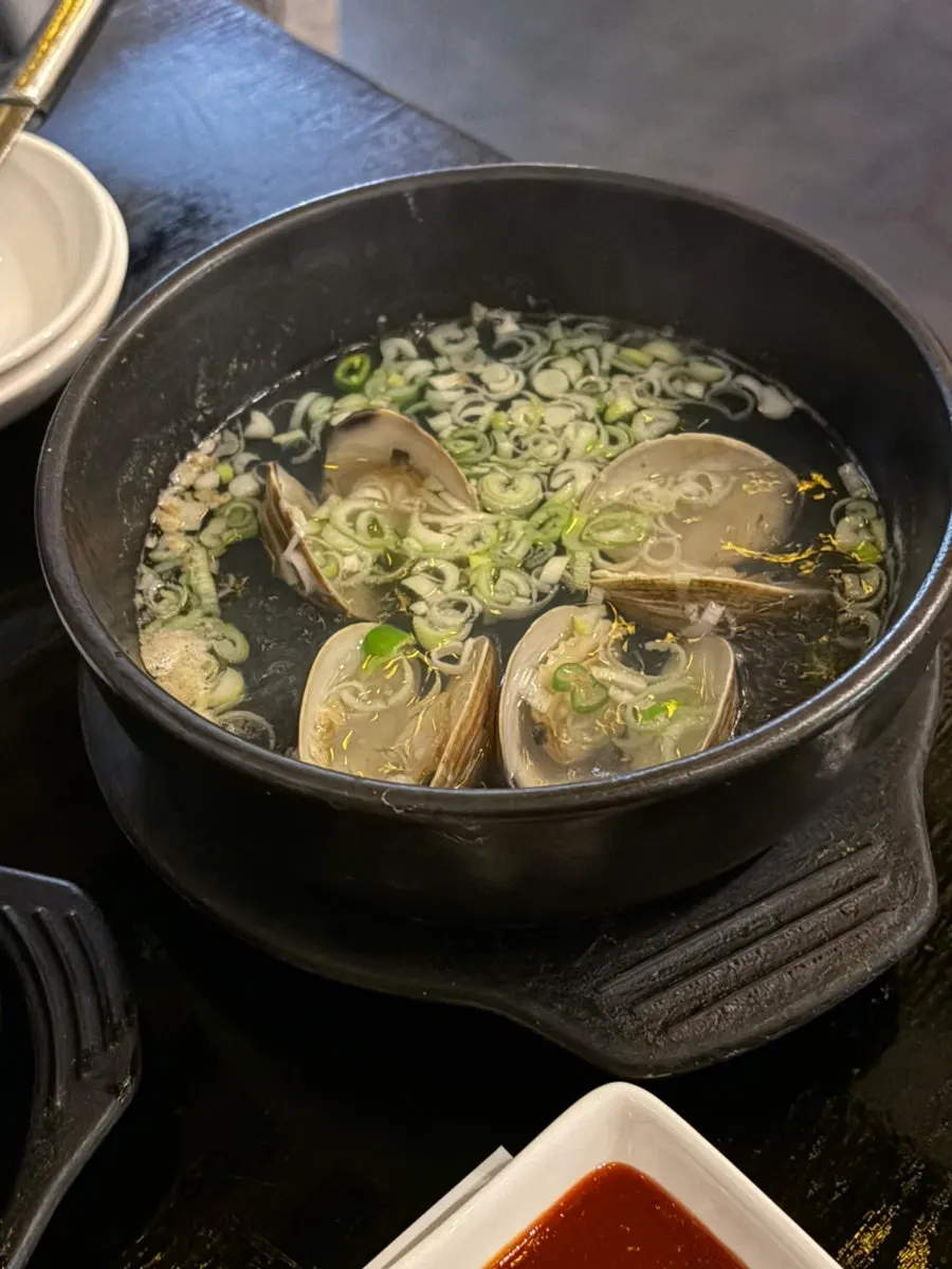 Clam soup with hard clams and scallions