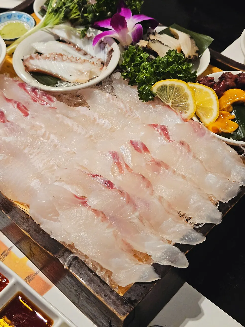 Close-up of red snapper and flatfish sashimi at Damiseon
