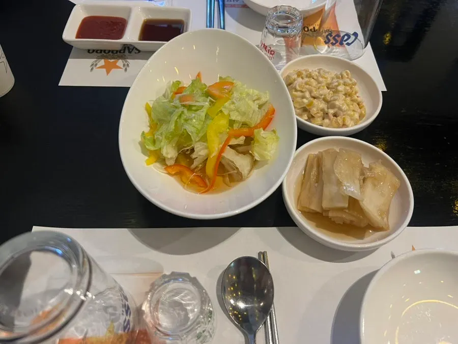 Salad and corn mayo served with the sashimi set