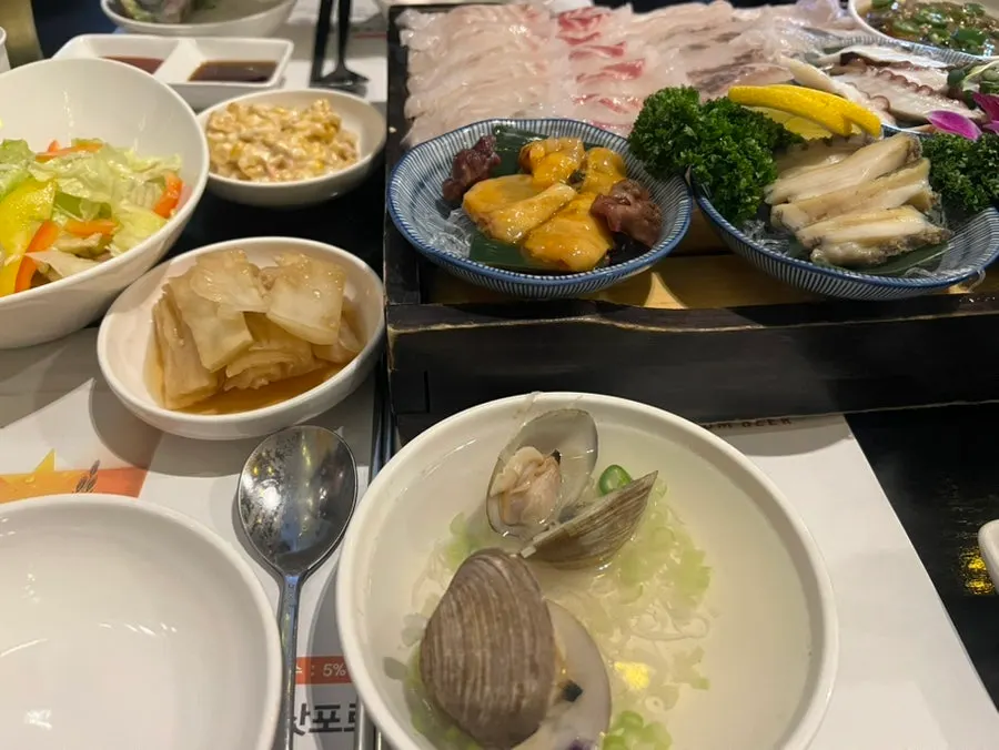 A bowl of complimentary clam soup