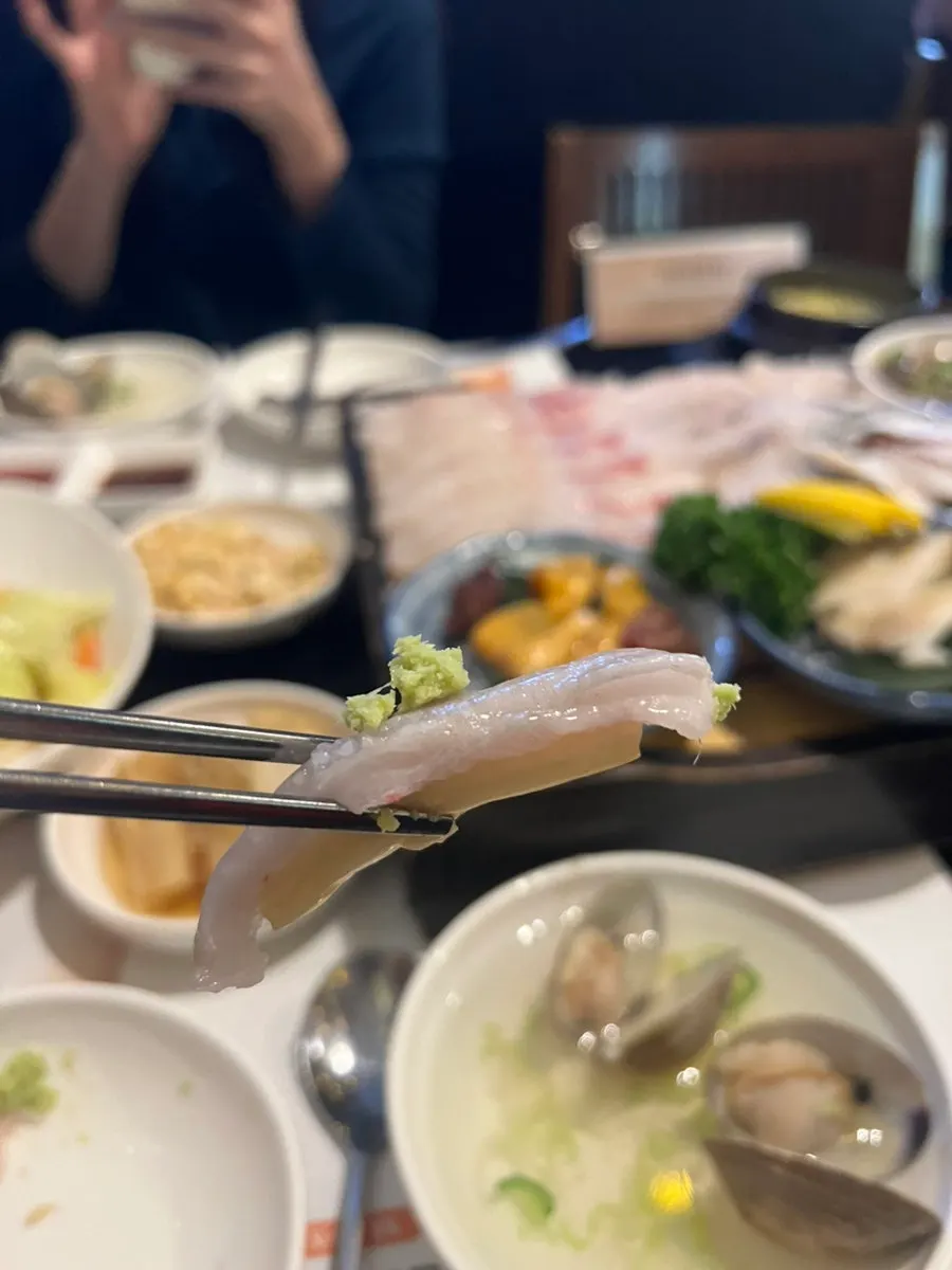 Sashimi wrapped with aged kimchi