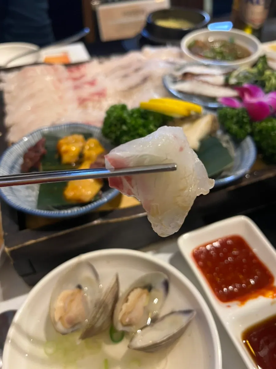 A plate of shrimp tempura served hot