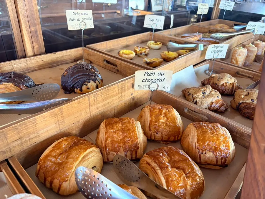 Pain au chocolat, vanilla crouton, and tissue bread on display