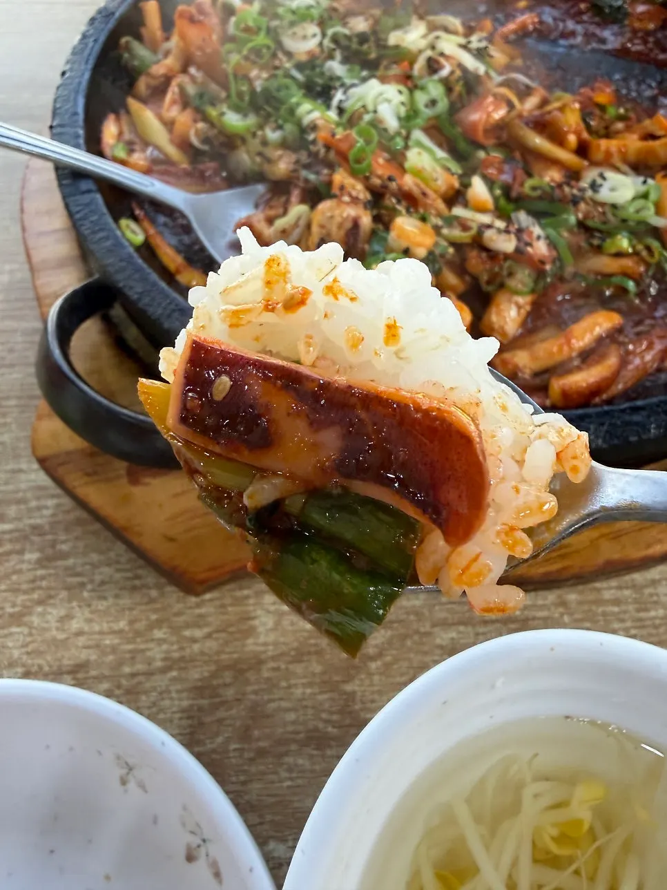 Spicy stir-fry with large pieces of squid