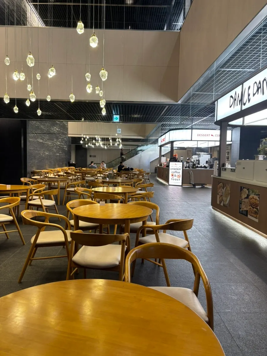 Seating area with tables for 2–4 people