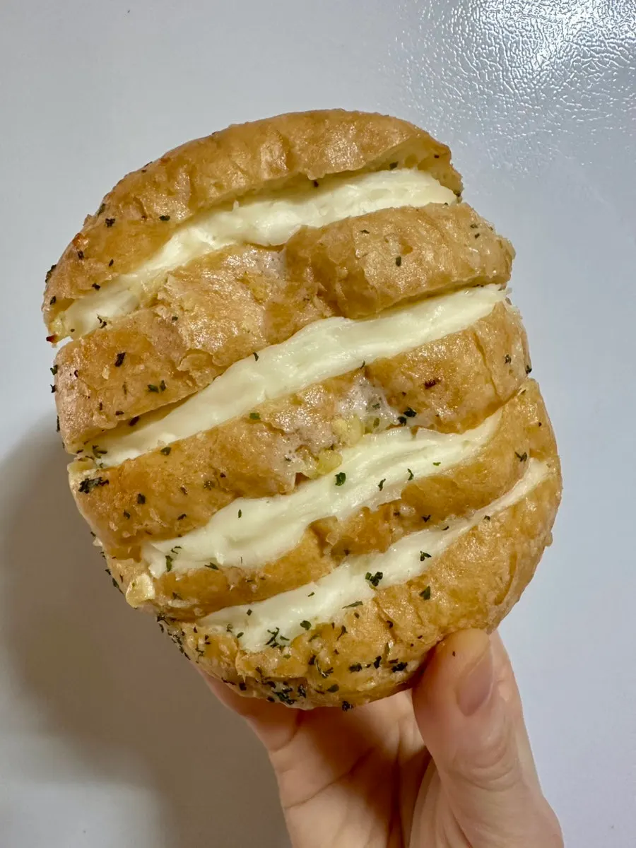 Several kinds of garlic bread arranged together