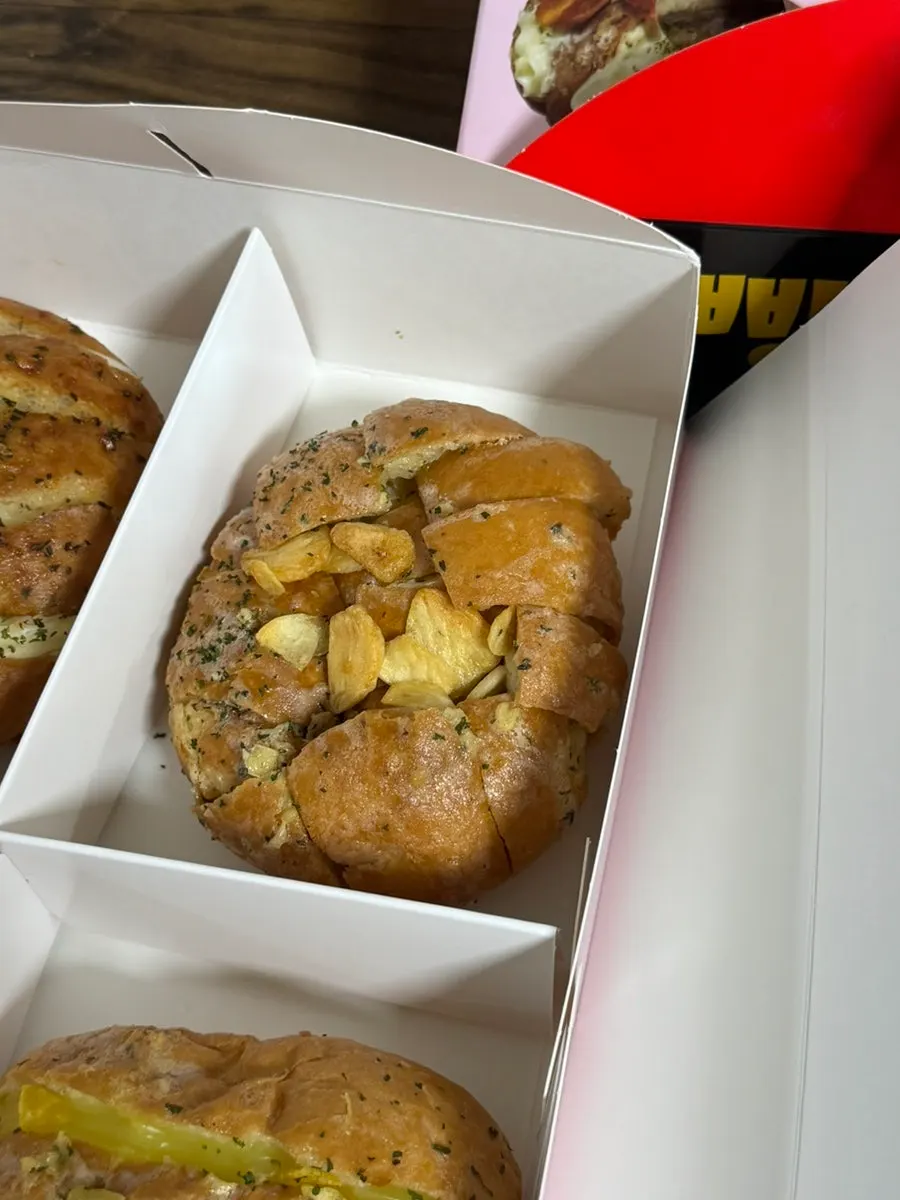 All four types of garlic bread laid out together