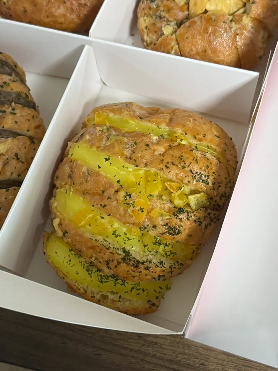 Takeout bag of Danppang Bakery garlic bread
