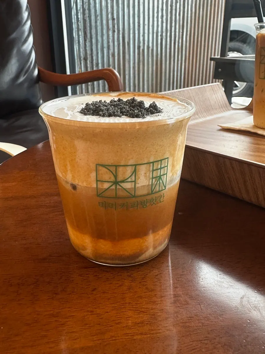 Misutgaru cream latte topped with black sesame